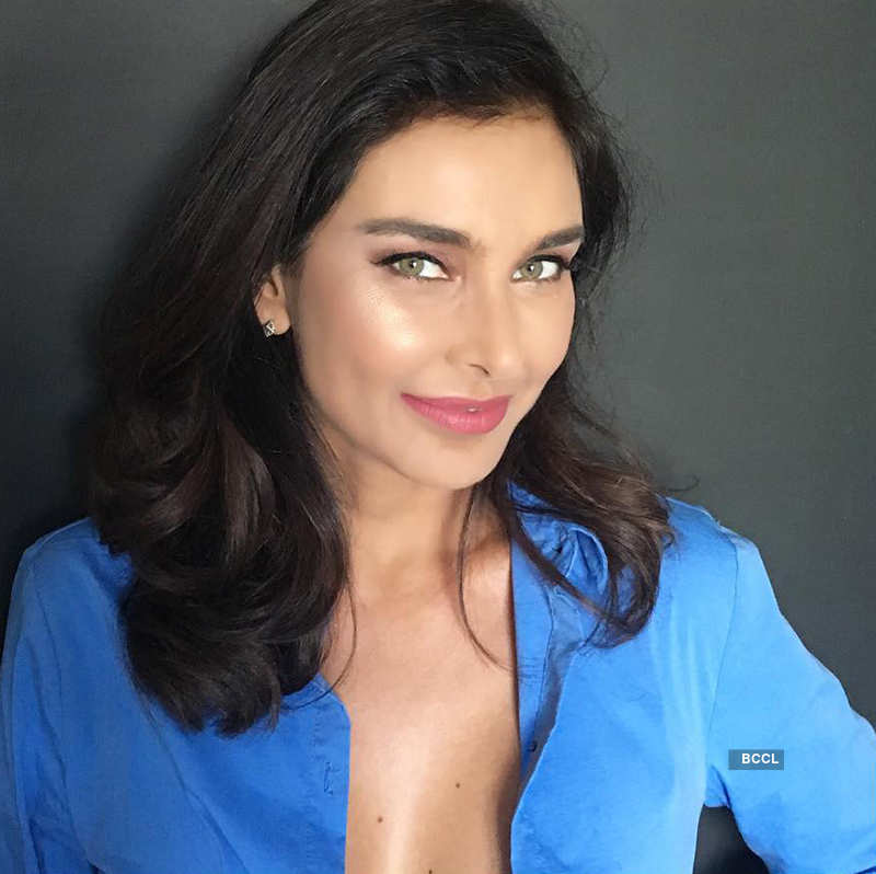 Unaffected by trolls, Lisa Ray turns up the heat with her sultry photoshoots