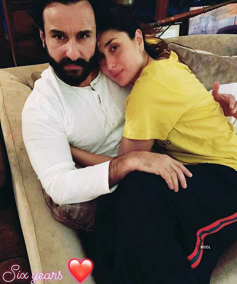 This picture of Saif Ali Khan all set to chop son Taimur's long, shaggy hair will make you smile