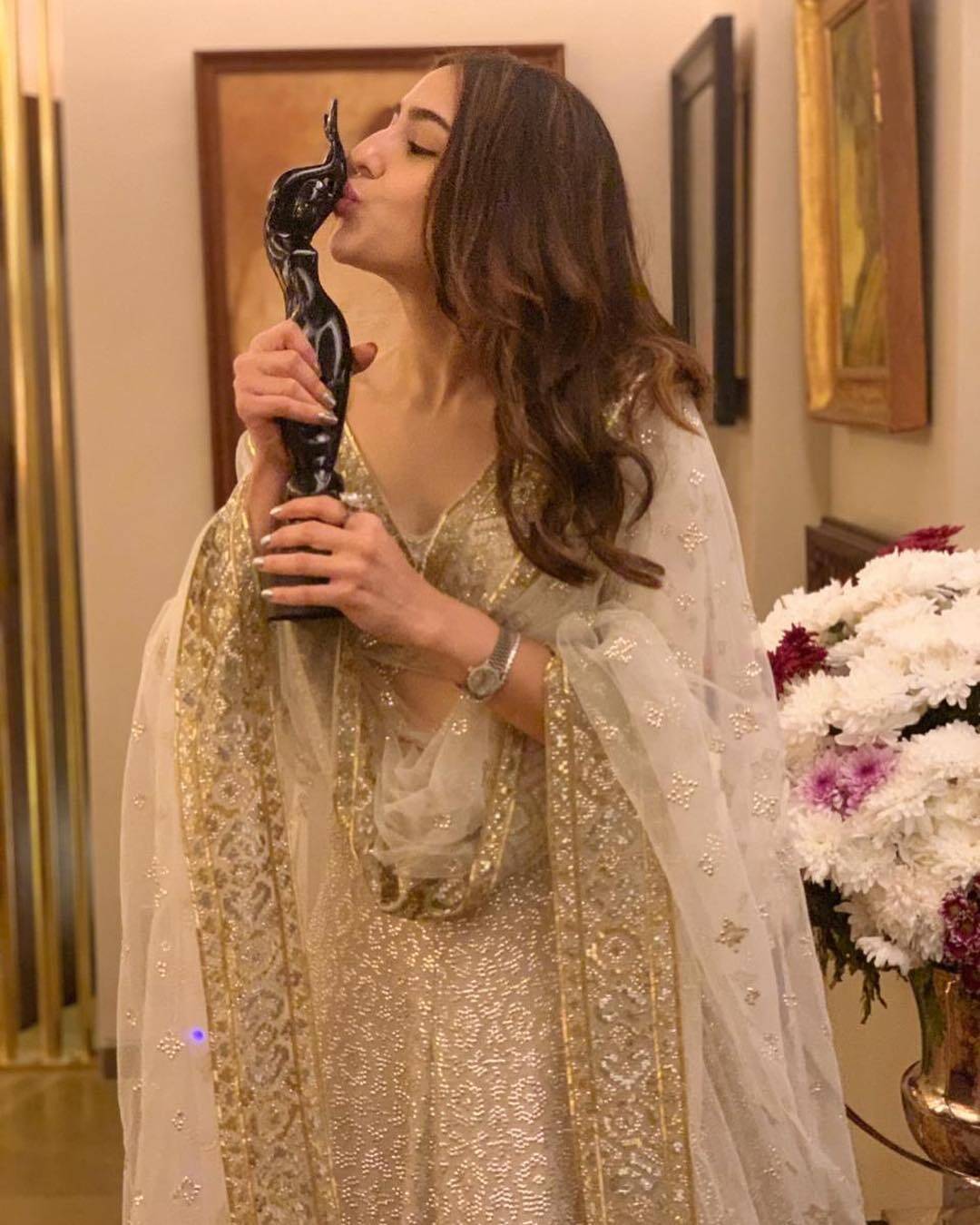 Sara Ali Khan poses with her trophy as she wins the best debut actress ...