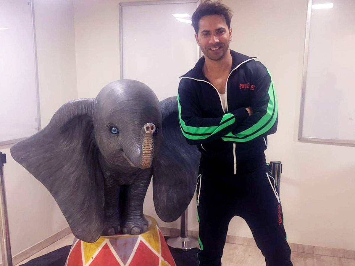 ​Varun Dhawan beams with joy as he poses with Dumbo the elephant