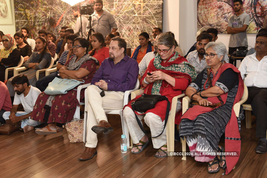 Artists, academicians and socialites attend an art symposium