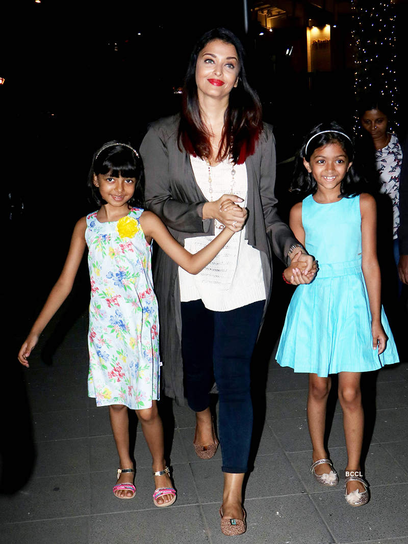 Why is Aishwarya Rai Bachchan always holding her daughter's hands