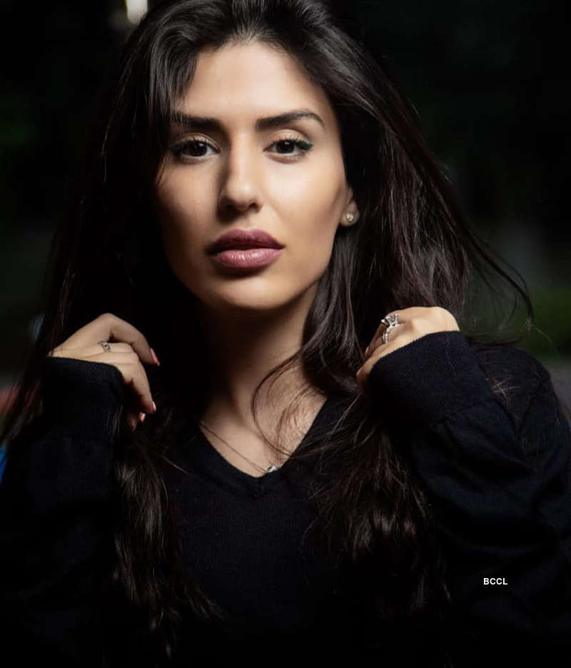 Iranian beauty queen Melika Razavi chases the poker game around the world