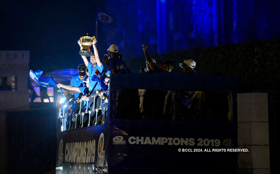 Mumbai Indians celebrate victory with fans in open-bus parade