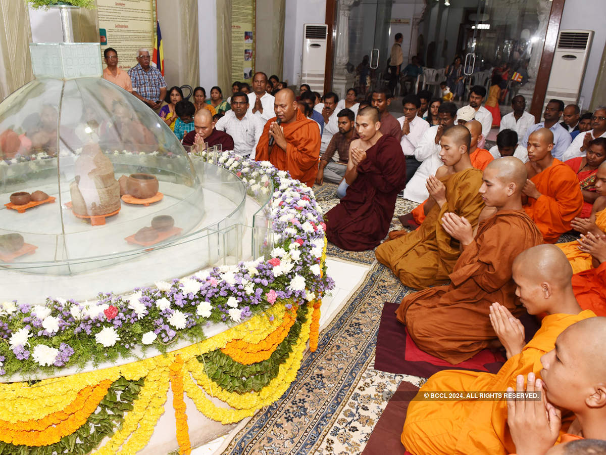 Devotees celebrate Buddha Purnima at Tank Bund