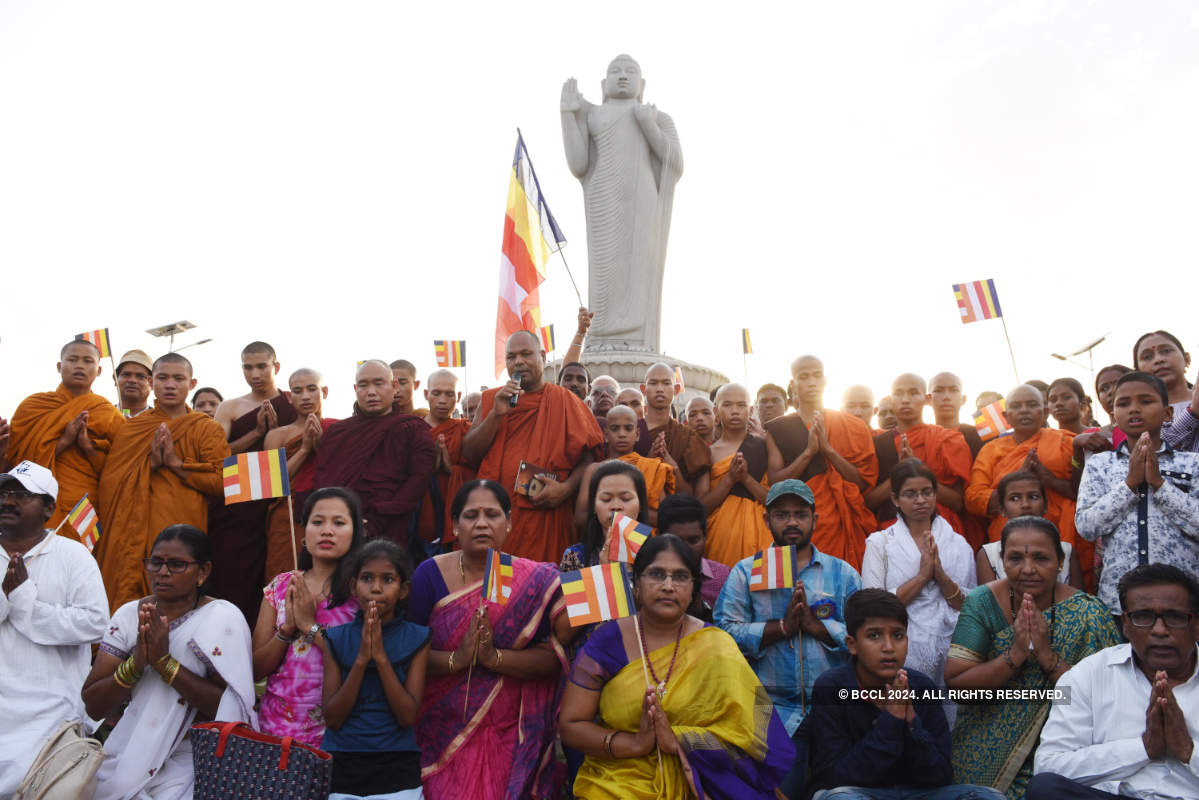 Devotees celebrate Buddha Purnima at Tank Bund