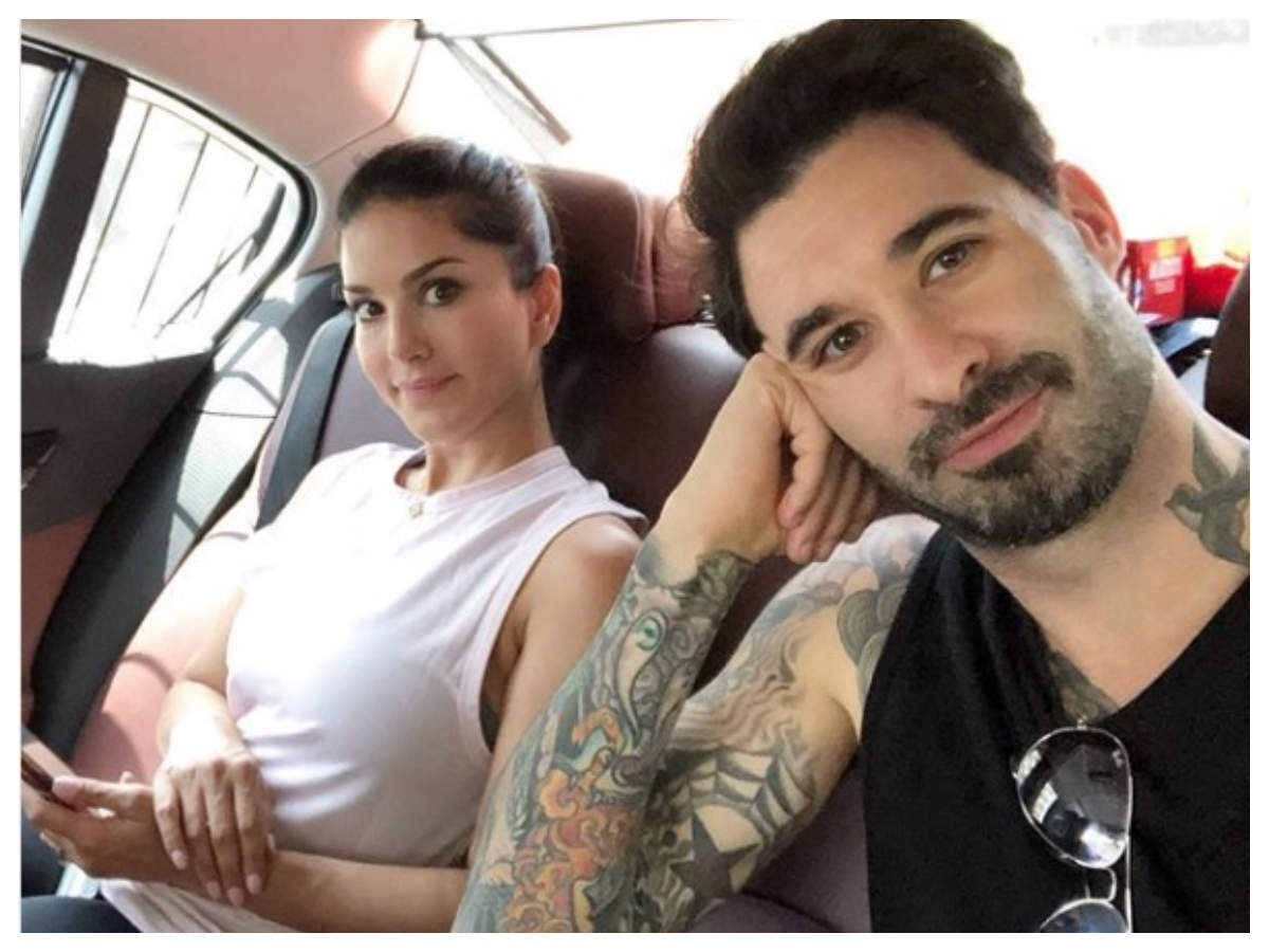 Photo Sunny Leone mocks husband Daniel Weber as he clicks a selfie with her post workout picture