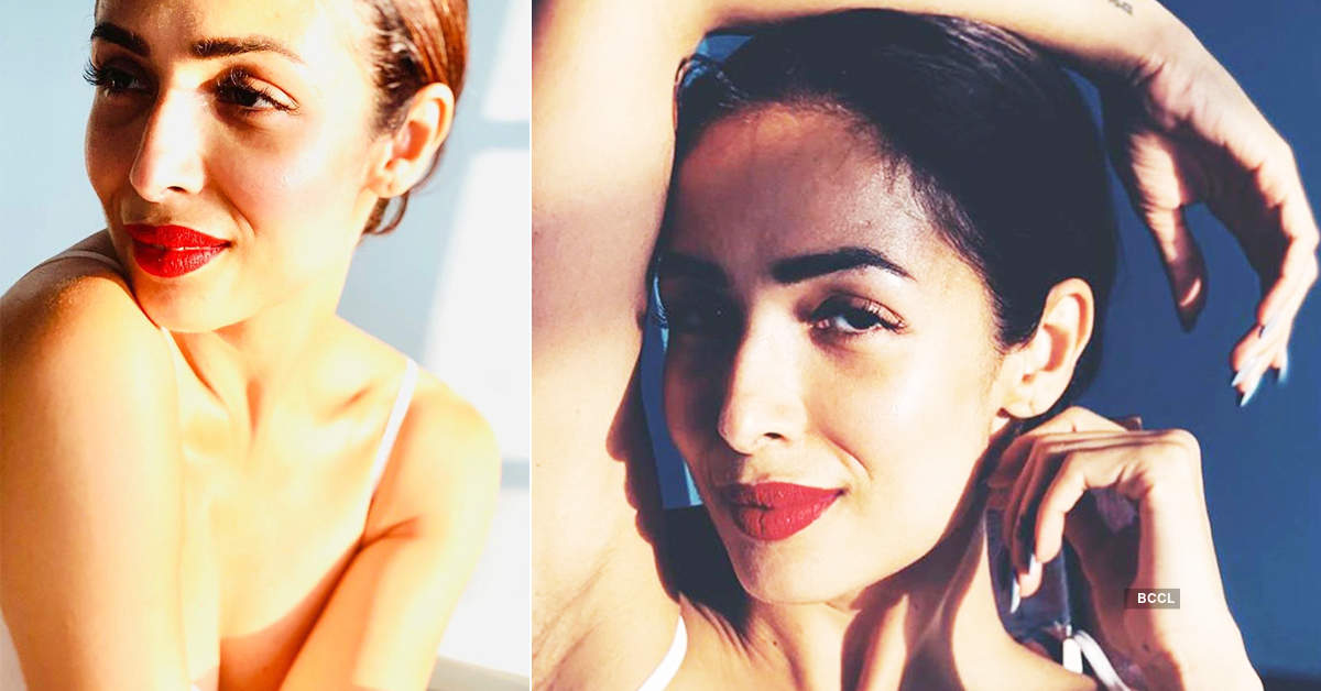 Malaika Arora drops head-turning pictures in multi-tiered dress
