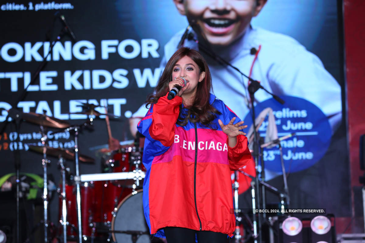 Monali Thakur performs at an event