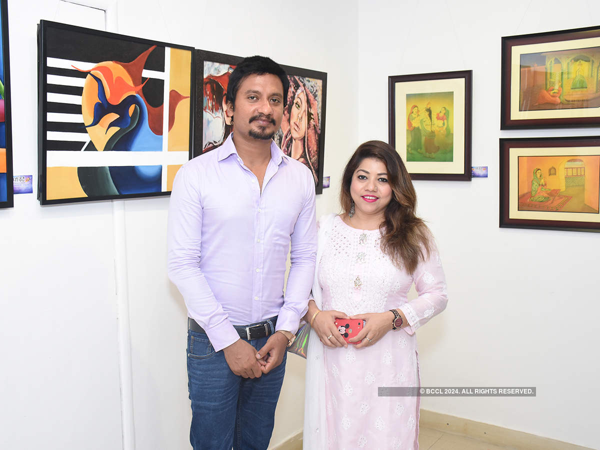 Art lovers attend an exhibition