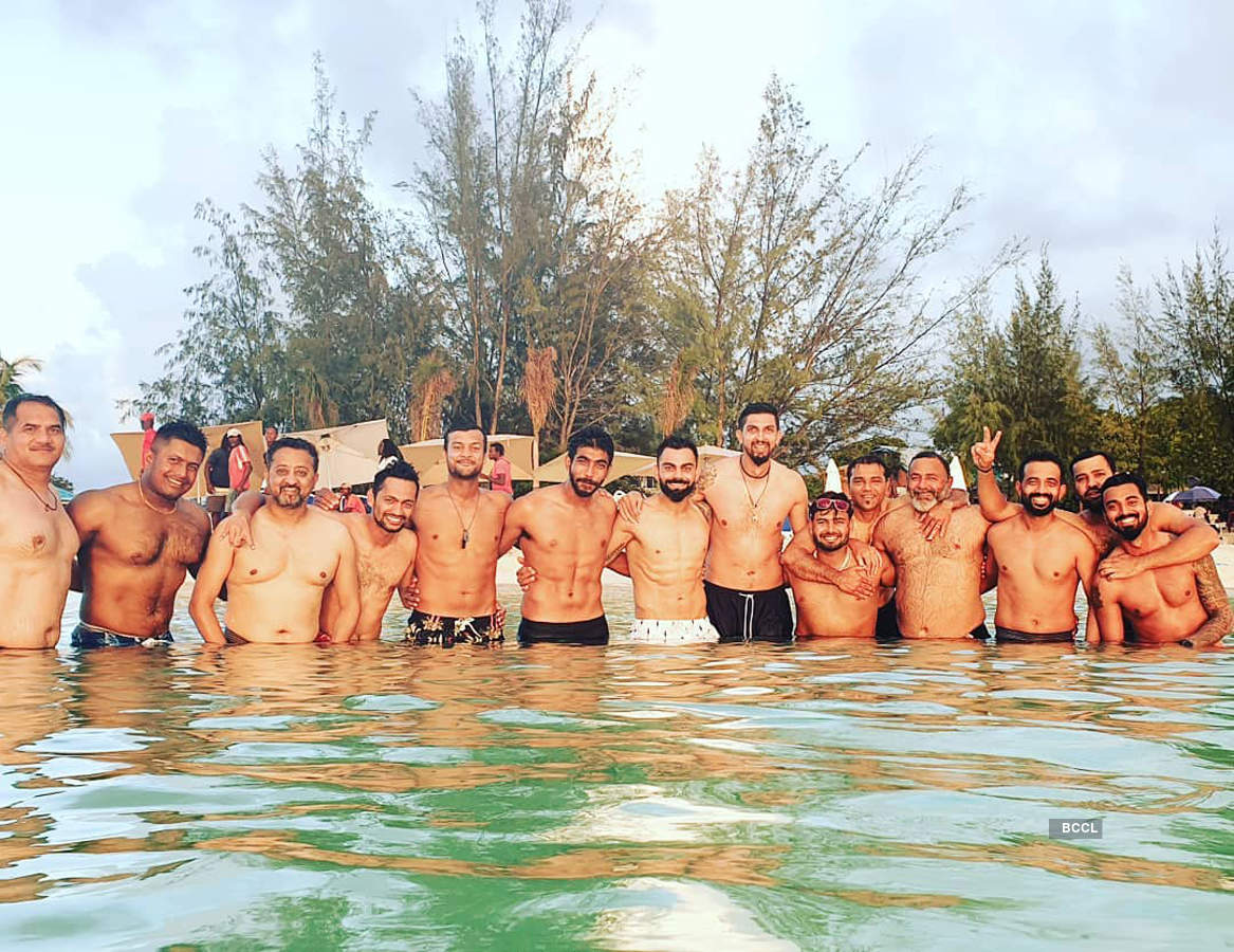 Virat Kohli flaunts abs while chilling with Indian team on a beach