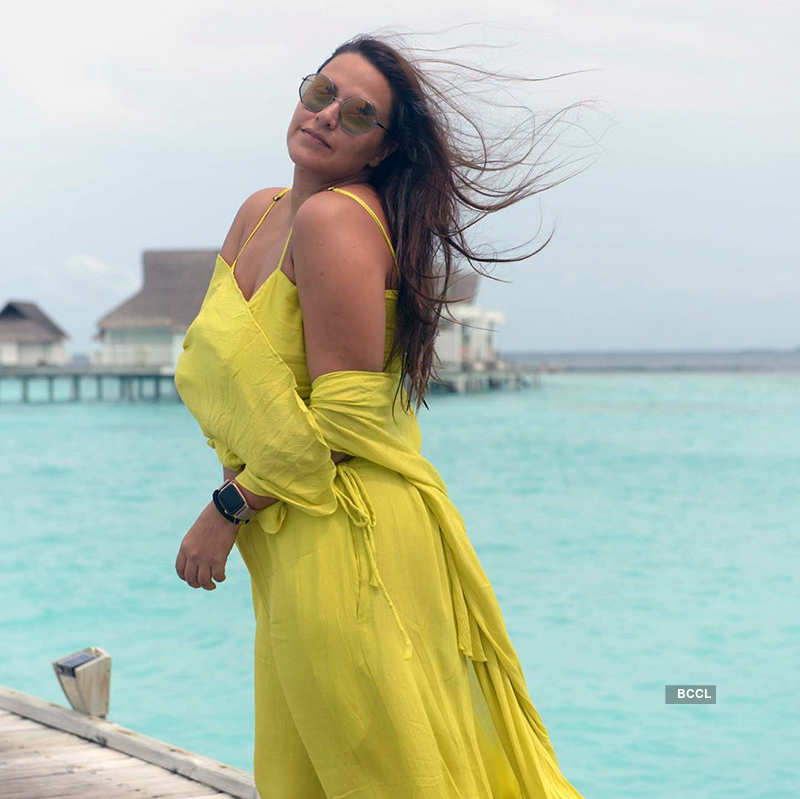 Mommy-to-be Neha Dhupia flaunts her baby bump in these new pictures