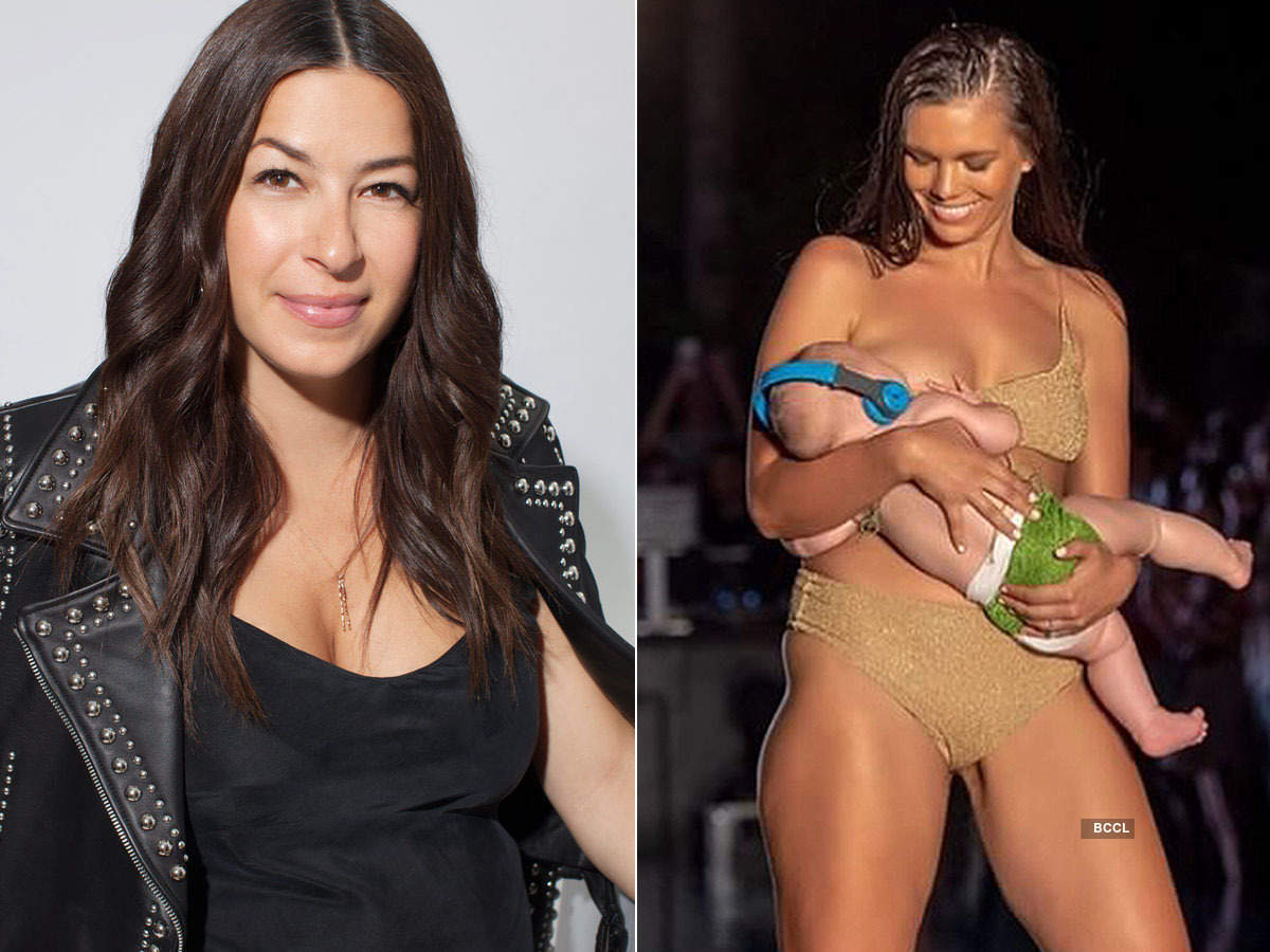 Model Mara Martin breastfeeds her child during the NYFW show