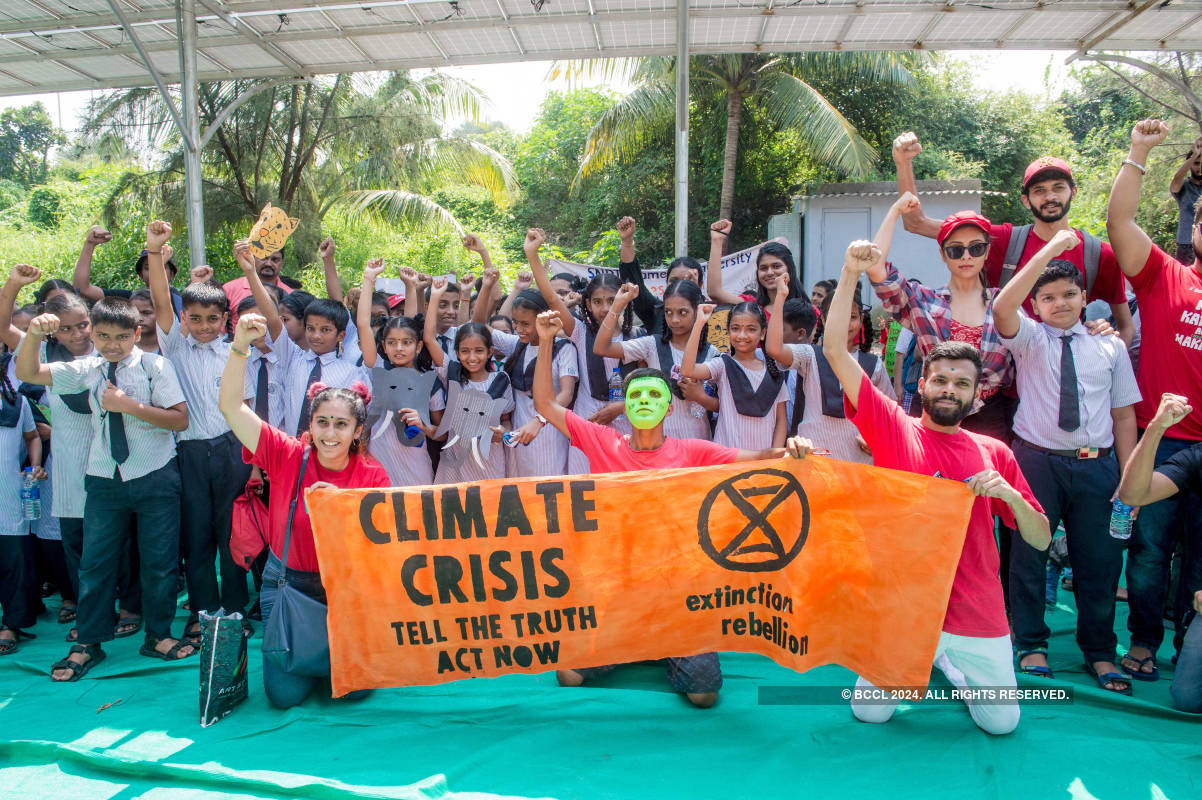 Mumbaikars participate in a 'die-in' to protest climate change