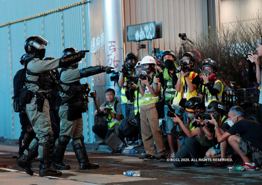 Hong Kong protesters hurl petrol bombs after police fire tear gas to clear rally