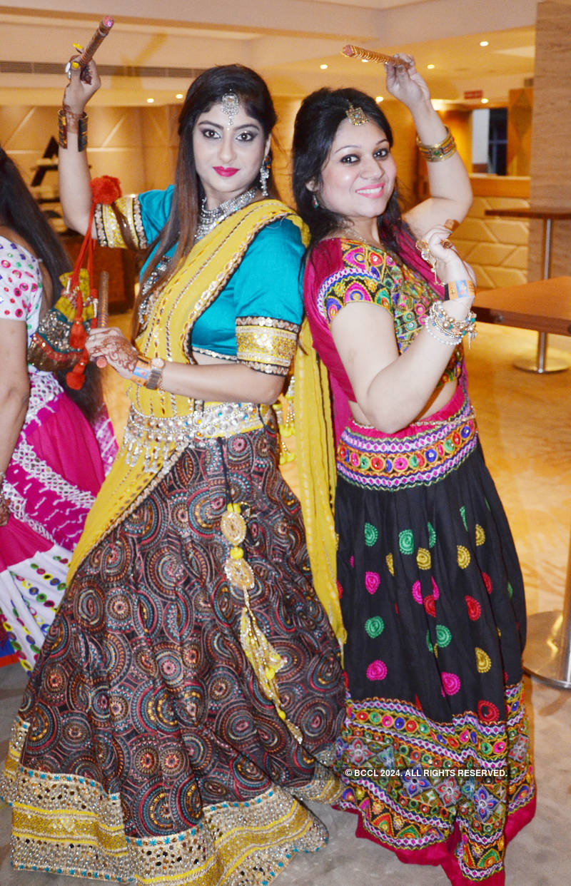 Ladies step out in style to attend a dandiya night