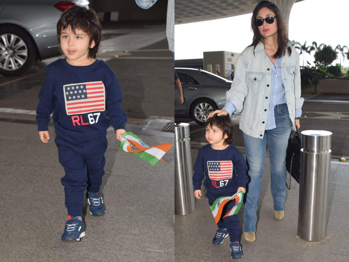 ​Photos: Taimur Ali Khan waves the Indian flag at the paparazzi as he arrives at the airport with Kareena Kapoor Khan