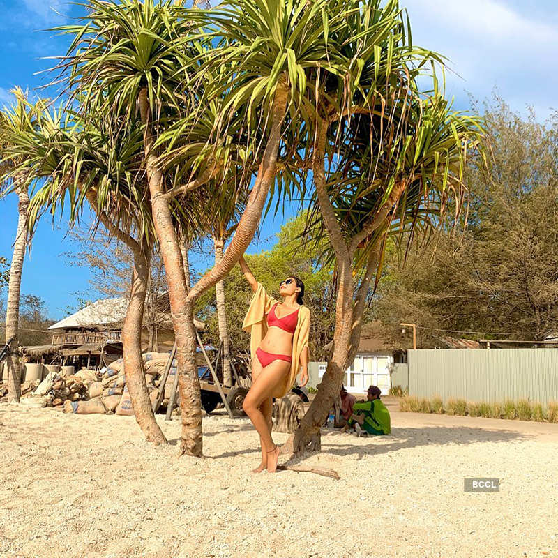 Actress Katie Iqbal turns up the heat with her bikini pictures