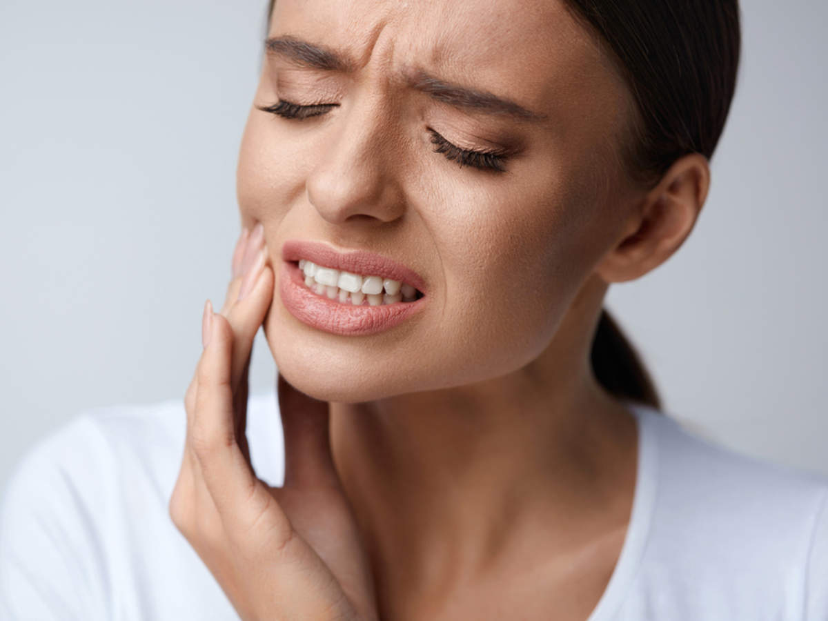 5 natural remedies to get rid of tooth and gum pain | The Times of India
