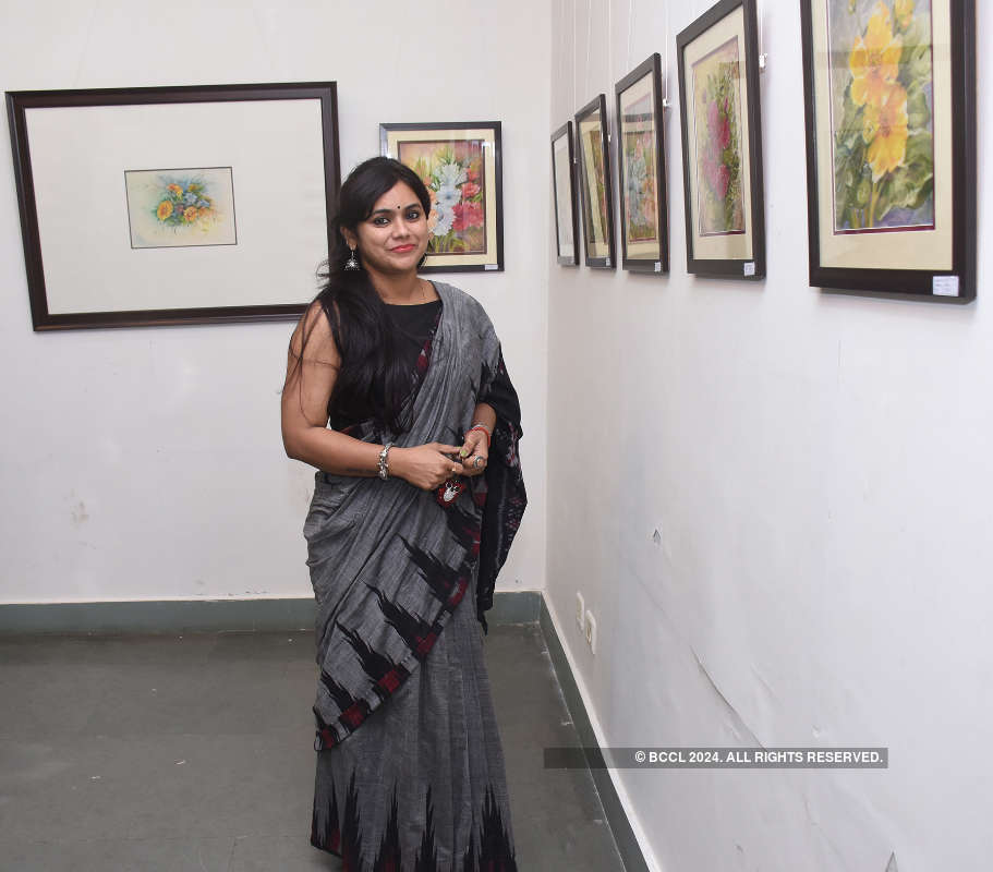 Art lovers attend a flowery show at Lalit Kala Akademi