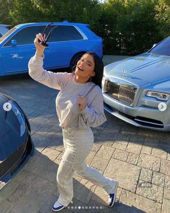 Irresistible pictures of Kylie Jenner posing with her fleet of luxury cars worth more than $14 million