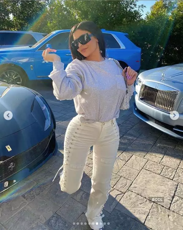 Irresistible pictures of Kylie Jenner posing with her fleet of luxury cars worth more than $14 million