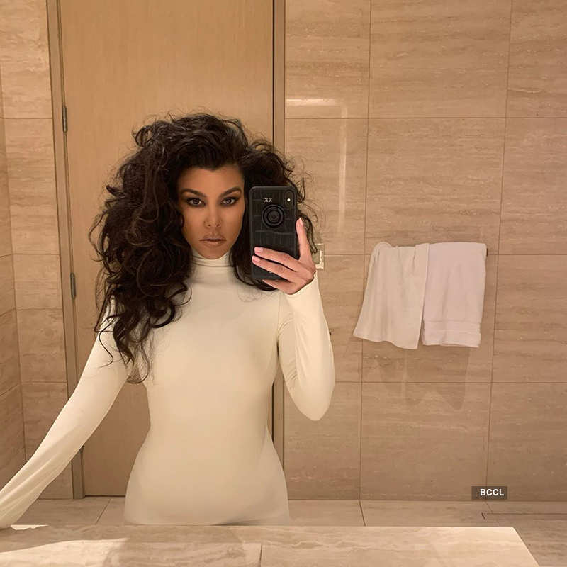 Bikini-clad Kourtney Kardashian is turning heads with her vacation pictures