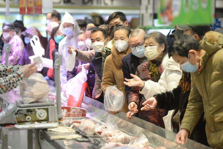 Photos show how Wuhan is grappling with deadly coronavirus outbreak