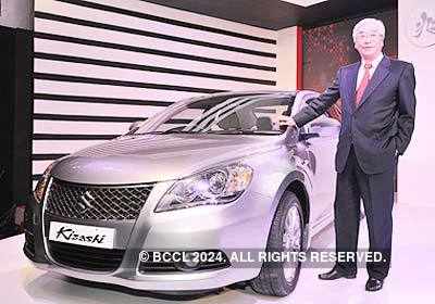 Maruti Suzuki India Chief Executive Officer Shinzo Nakanishi Poses With A Maruti Suzuki Kizashi At Its Launch In New Delhi On Feb Photogallery