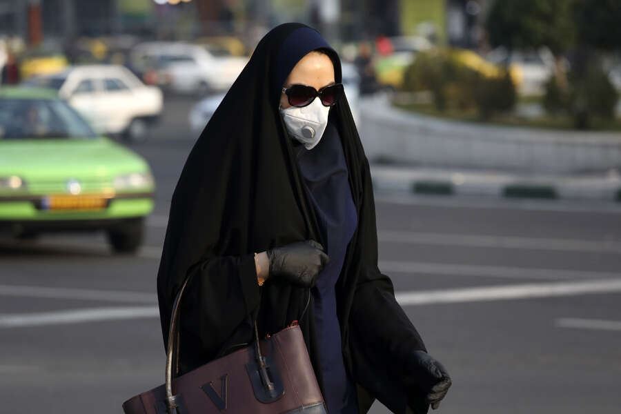 These pictures show how coronavirus epidemic engulfs Iran