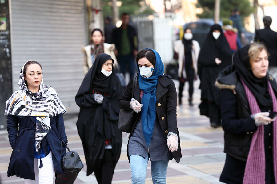 These pictures show how coronavirus epidemic engulfs Iran