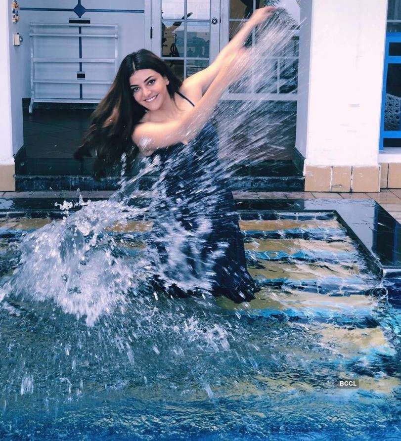 Stunning pictures of actress Kajal Aggarwal enjoying in a pool go viral