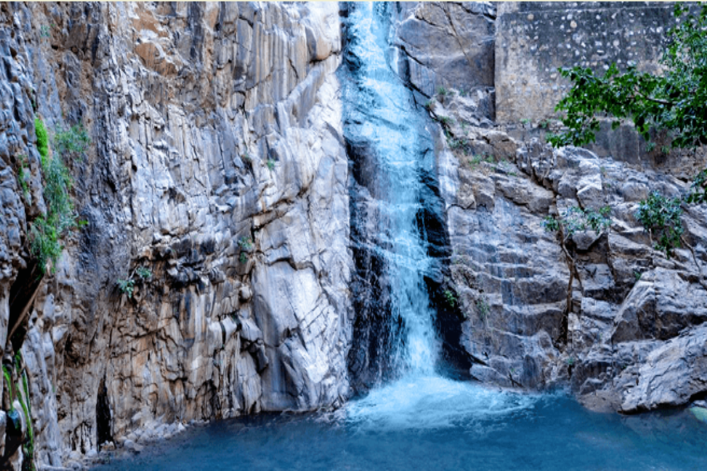 A rare, delightful waterfall in Rajasthan near Alwar - Garbhaji Falls ...