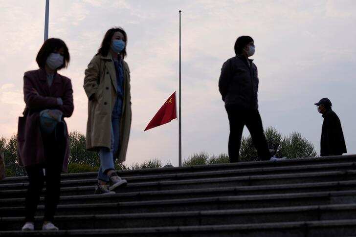 China mourns thousands who died in country's coronavirus epidemic