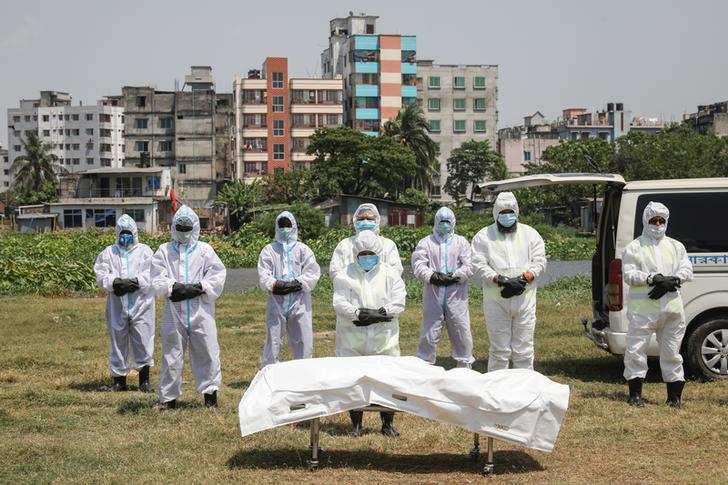 Bone-chilling pictures of mass graves for coronavirus victims