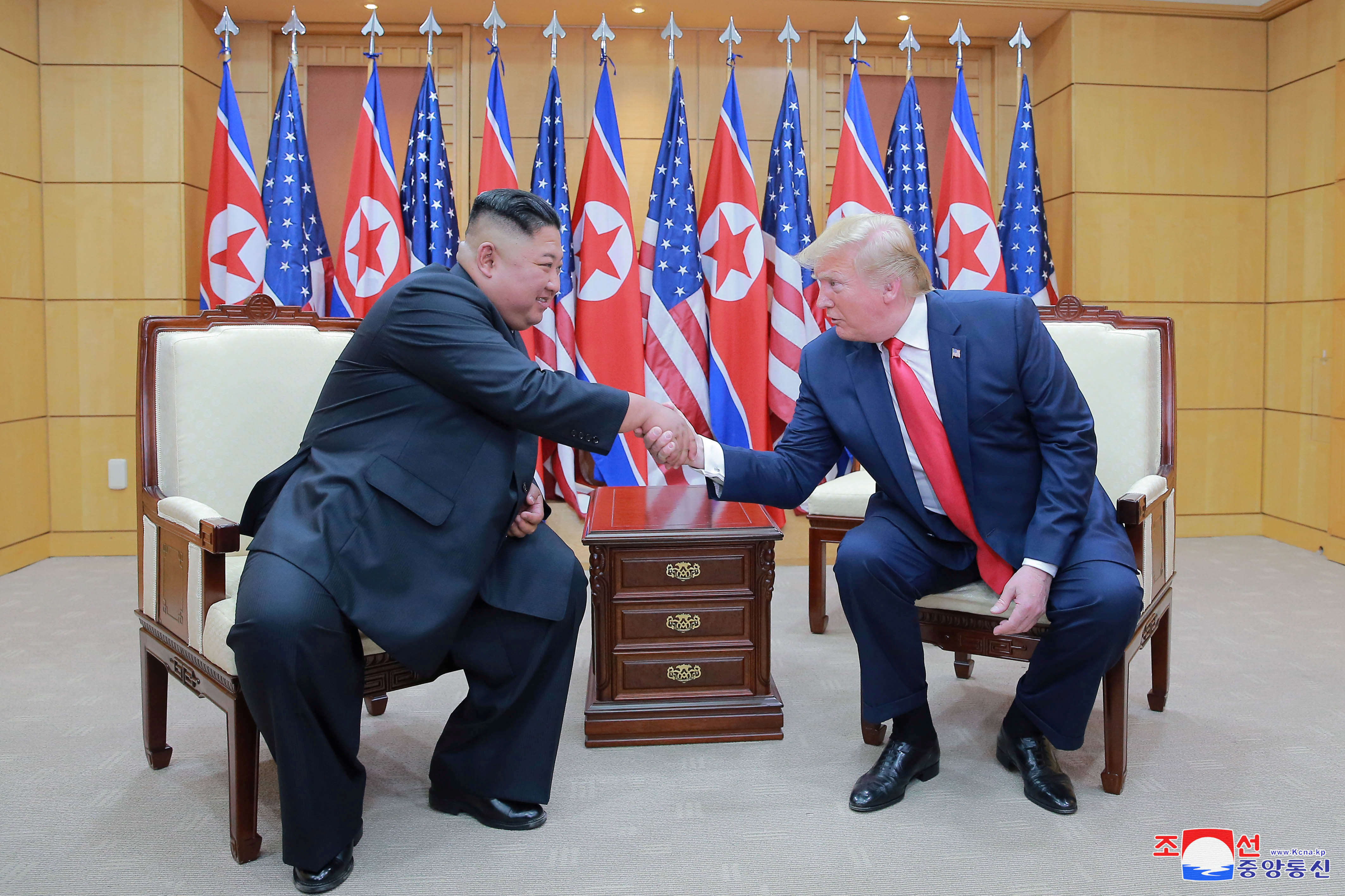 US President Donald Trump And North Korean Leader Kim Jong Un Shake ...