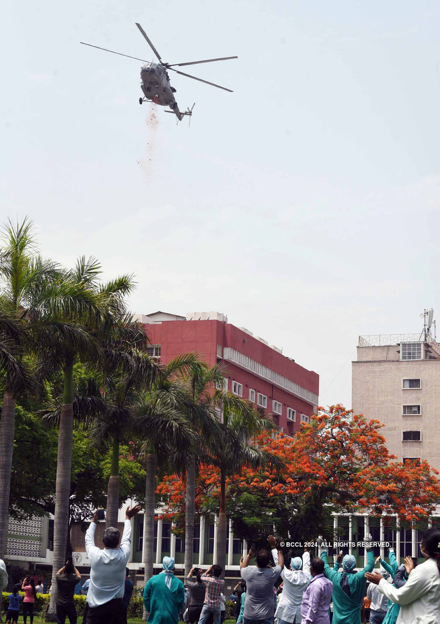 Armed forces salute 'corona warriors' by showering flower petals from choppers