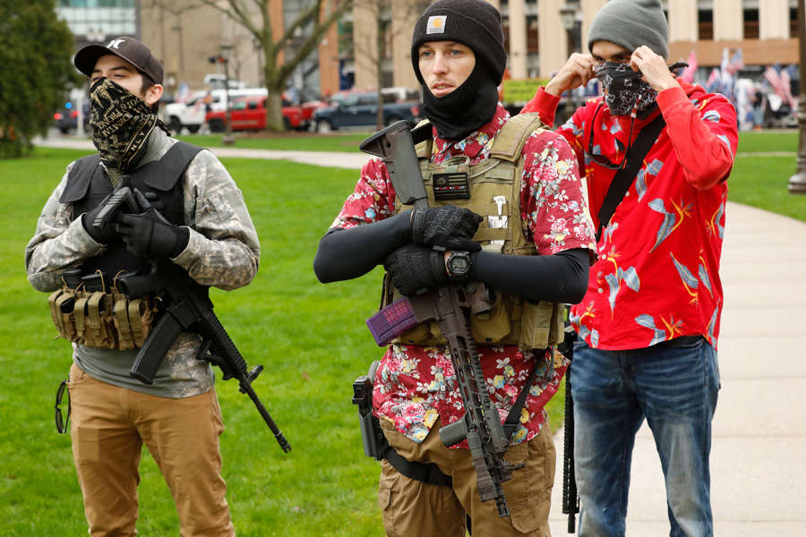 In pics: Armed protesters storm Michigan State House against COVID-19 lockdown