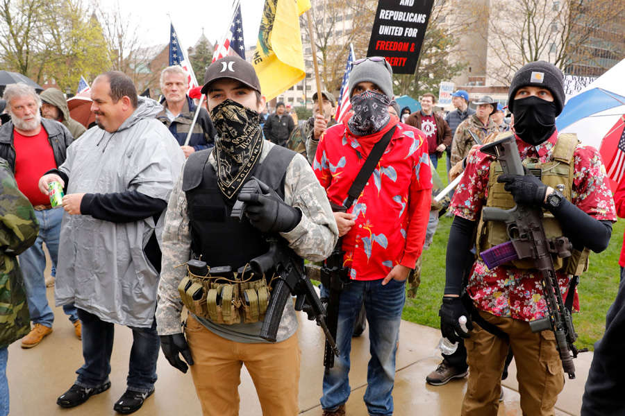 In pics: Armed protesters storm Michigan State House against COVID-19 lockdown