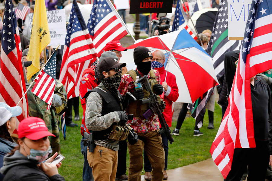 In pics: Armed protesters storm Michigan State House against COVID-19 lockdown