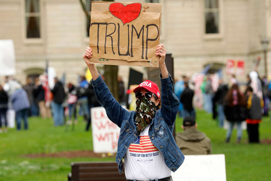 In pics: Armed protesters storm Michigan State House against COVID-19 lockdown