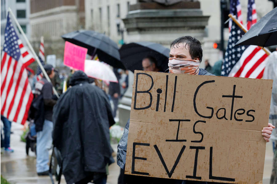 In pics: Armed protesters storm Michigan State House against COVID-19 lockdown