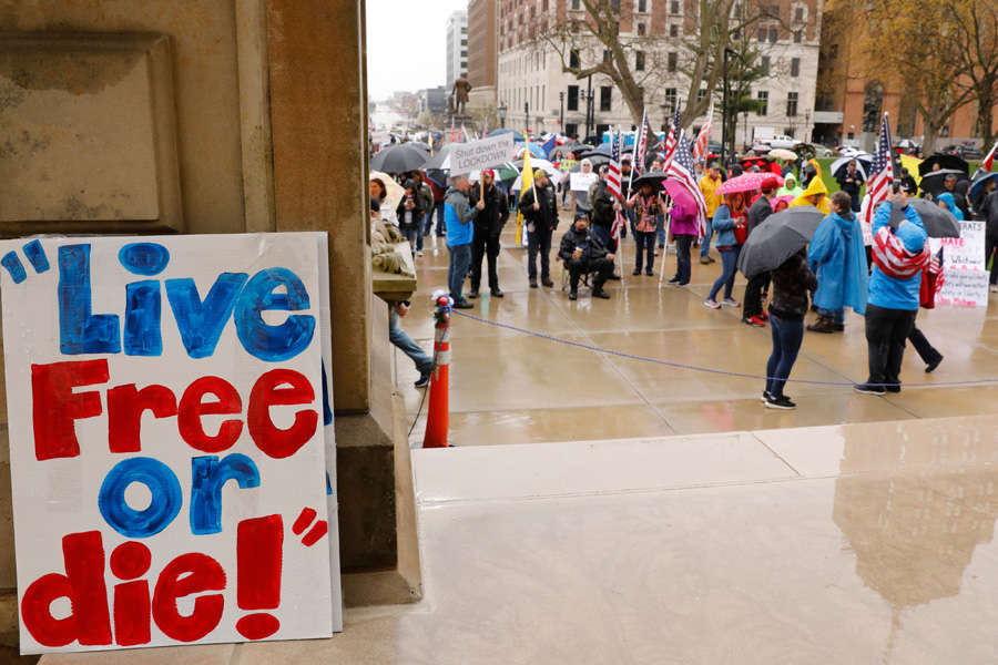 In pics: Armed protesters storm Michigan State House against COVID-19 lockdown