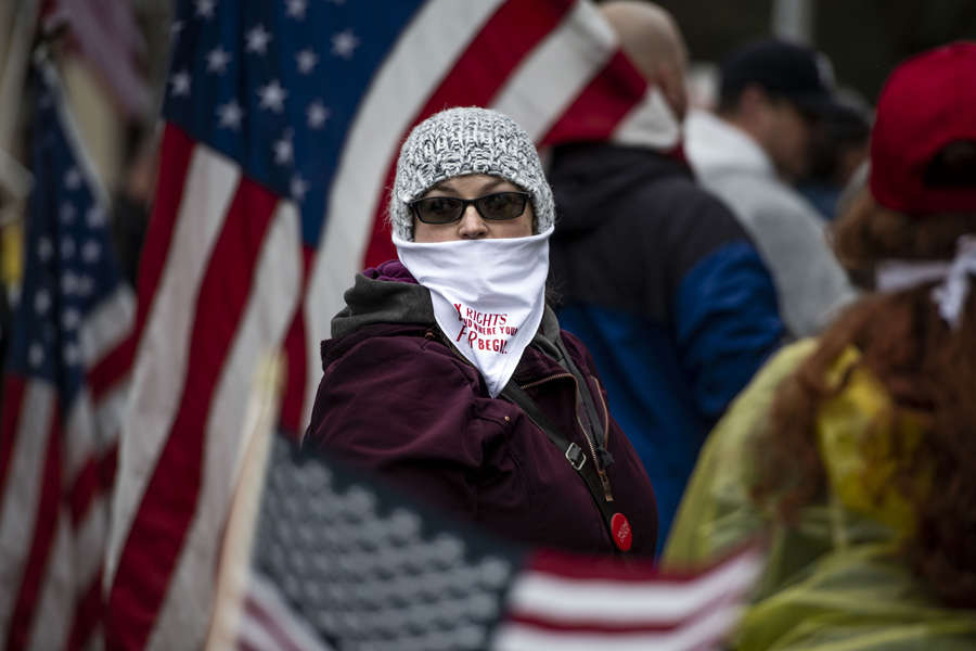 In pics: Armed protesters storm Michigan State House against COVID-19 lockdown