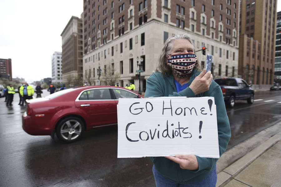 In pics: Armed protesters storm Michigan State House against COVID-19 lockdown