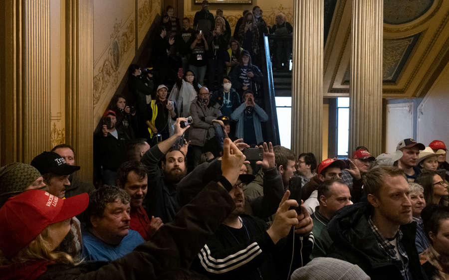 In pics: Armed protesters storm Michigan State House against COVID-19 lockdown