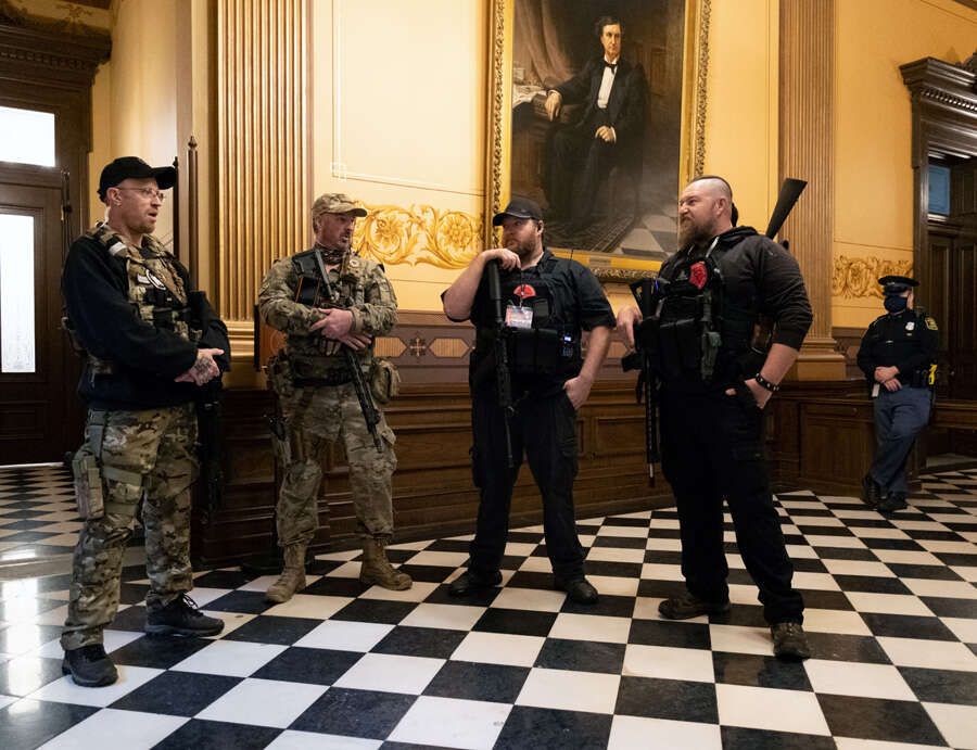 In pics: Armed protesters storm Michigan State House over COVID-19 lockdown