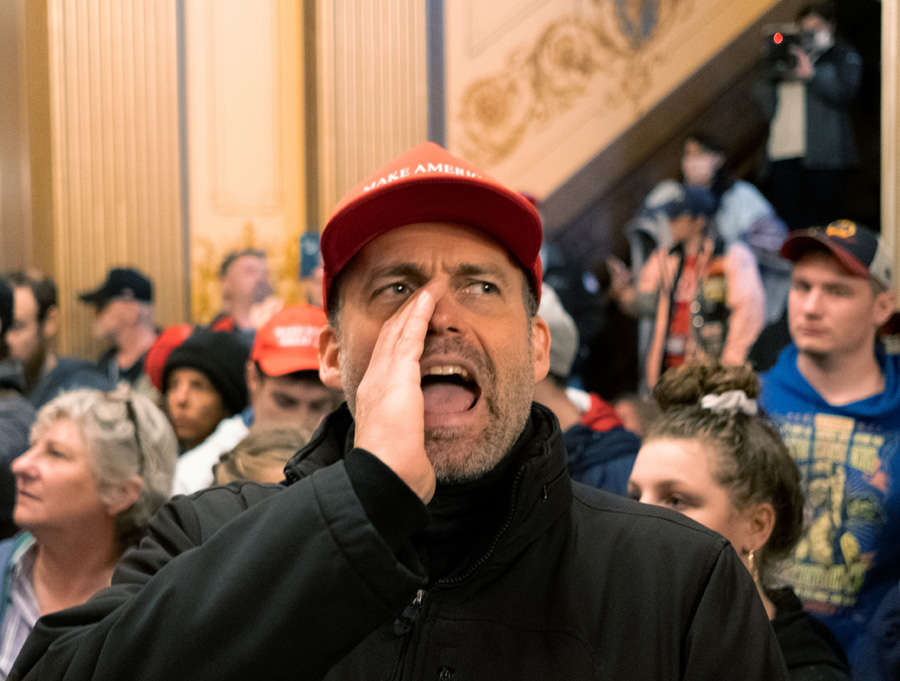 In pics: Armed protesters storm Michigan State House against COVID-19 lockdown