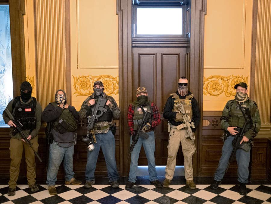 In pics: Armed protesters storm Michigan State House against COVID-19 lockdown