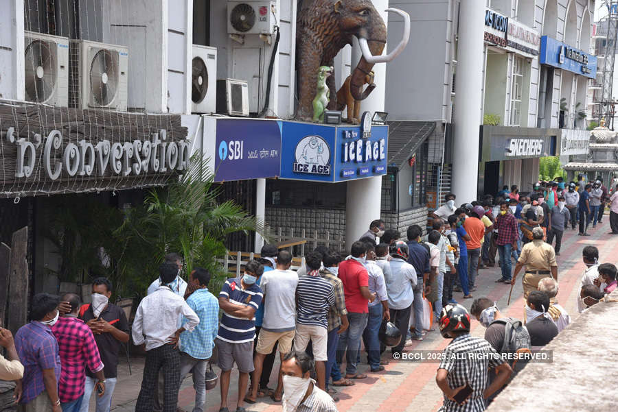 In pics: Long queues outside liquor shops as govt relaxes lockdown